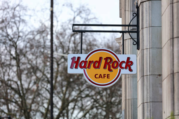 Hard Rock Cafe Sign, London London, UK - January 19, 2022:  Hard Rock Cafe sign outside a restaurant on Old Park Ln, London. modern rock stock pictures, royalty-free photos & images