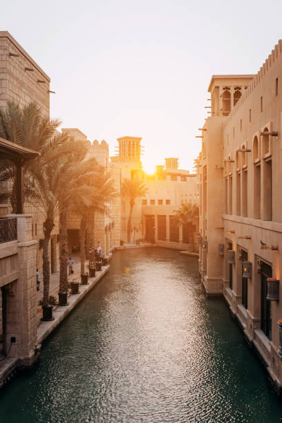 DUBAI, UAE - NOVEMBER 04, 2021 Madinat Jumeirah is an Arabian mini-city in Dubai, comprising five-star hotels, ornate souks and upmarket restaurants on sunset jumeirah stock pictures, royalty-free photos & images