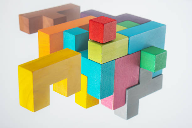 istock Abstract construction from wooden blocks. The concept of logical thinking. 1369565664