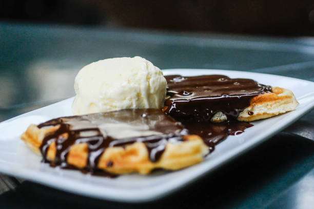 istock Waffle with chocolate frosting and ice cream 1369565871