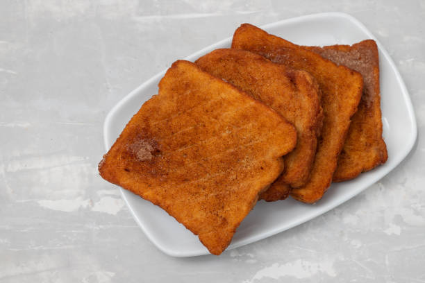 istock typical portuguese Christmas dessert fried bread with cinnamon 1369568932