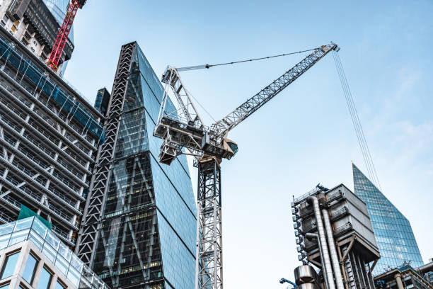 istock Skyscrapers and construction site in London 1369571336