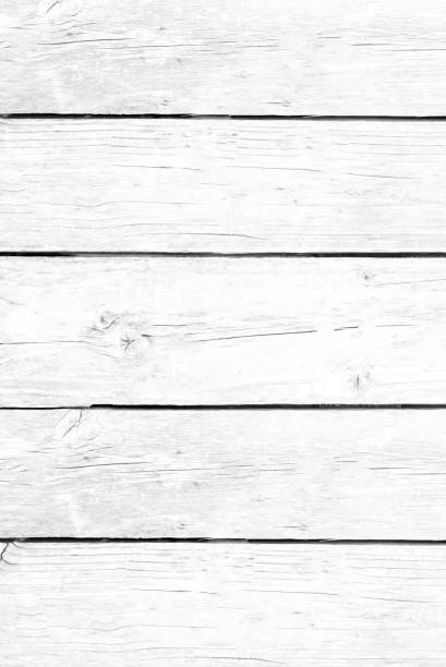 istock White gray wood color texture horizontal for background. Surface light clean of table top view. Natural patterns for design art work and interior or exterior. Grunge old white wood board wall pattern 1369572873