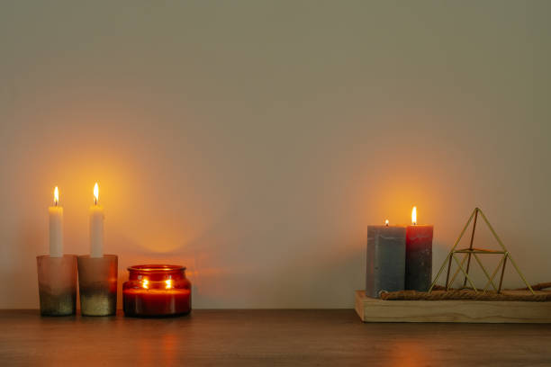 istock Candles on the wooden table with blank space for text 1369573919