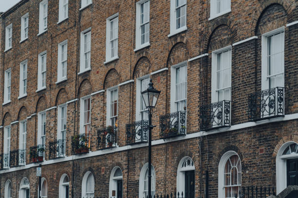 Row of Georgian houses on a street in Islington, London, UK. stock photo