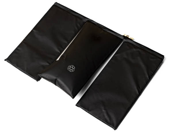 istock Damaged black swollen inflated Li-Ion polymer battery from tablet. 1369582641