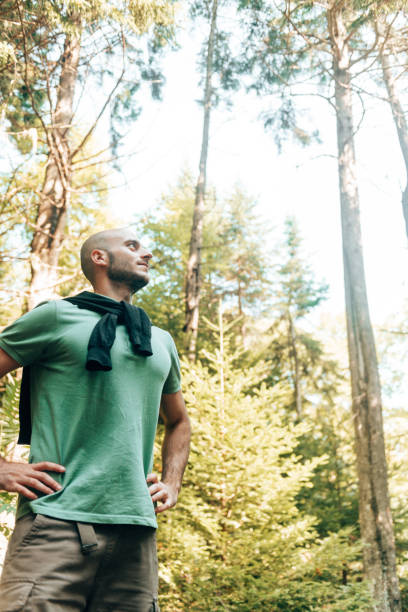 istock hapiness bald man smiling the forest 1369584038