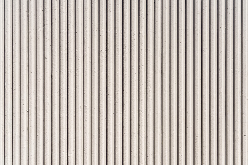Close-up of a grooved concrete background texture.