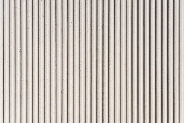 Close-up of a grooved concrete background texture.