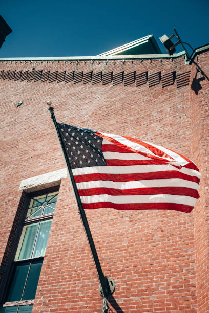 us flag waving on the sky