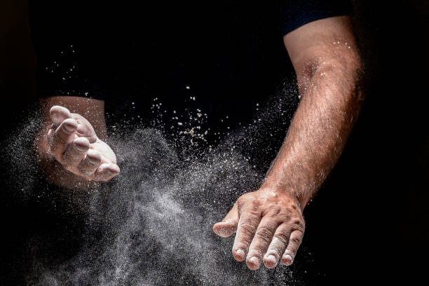 istock Male hands with flour 1369588490