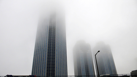 Business tower in the fog