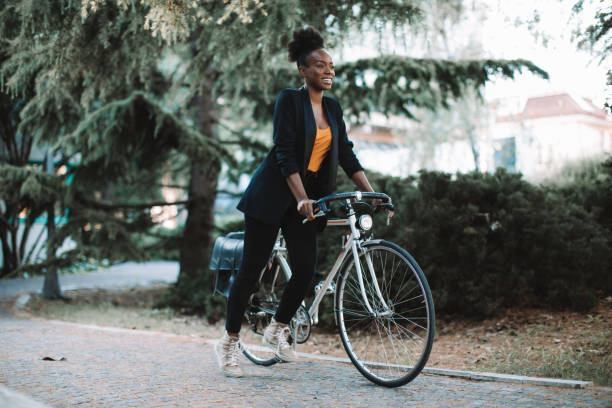 istock Woman commuting by bicycle 1369597802