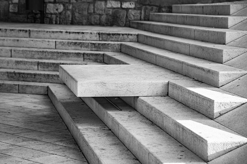 abstraction background. concrete stairs in the city in the sun.