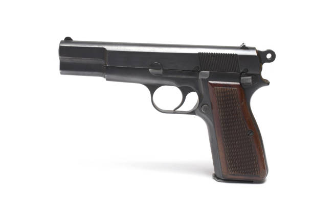 istock white background semi-automatic pistol wooden grip 1369604763