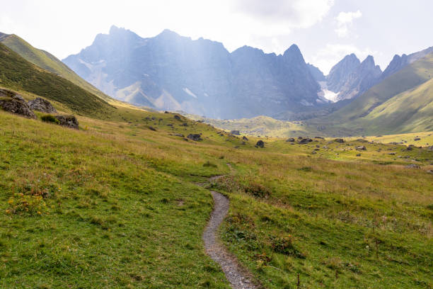 istock Roshka - A panoramic view on the sharp Chaukhi massif in the Greater Caucasus Mountain Range in Georgia. 1369605733
