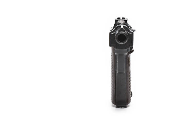 Spent cases with a handgun.