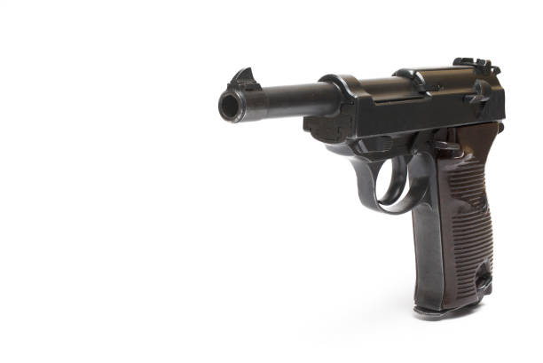 istock semi-automatic wooden grip pistol white background 1369606156