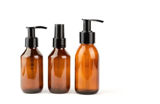 istock Cosmetic bottles with dispensers on a white background. SPA products 1369606881