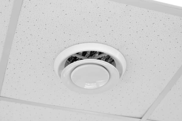 istock Round ventilation duct on the ceiling. Modern ventilation built into the ceiling. 1369606909