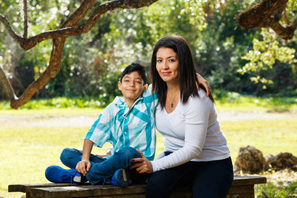 istock Mother and son outdoor portrait 1369607065