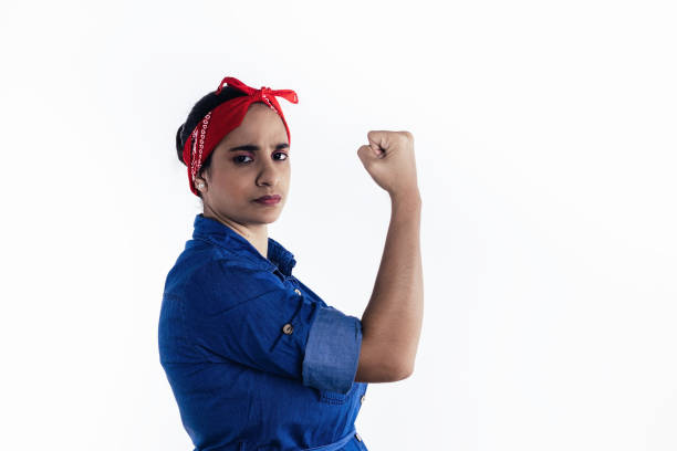 latin woman representing the concept of feminism in the studio with white background
