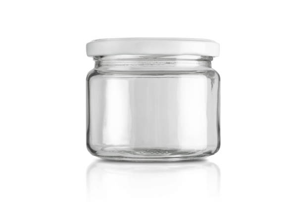 istock Glass jar isolated on white background with 1369609739