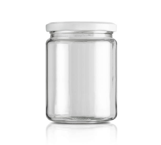 istock Glass jar isolated on white background with 1369609742
