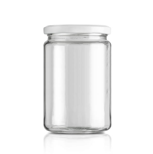 istock Glass jar isolated on white background with 1369609743