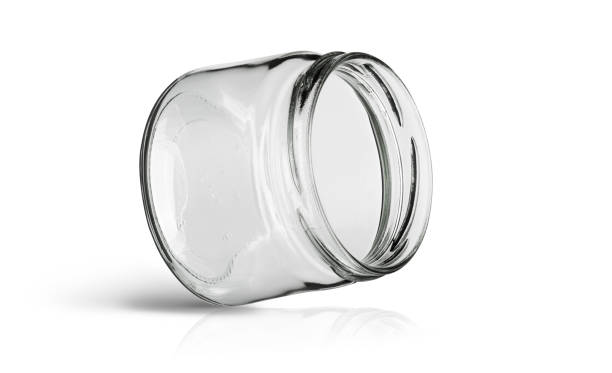 istock Glass jar kitchen utensil isolated on white 1369609745