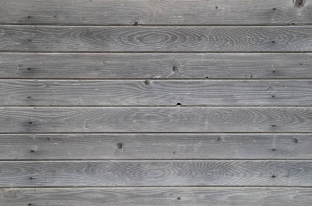 istock Old gray wooden wall close 1369610311