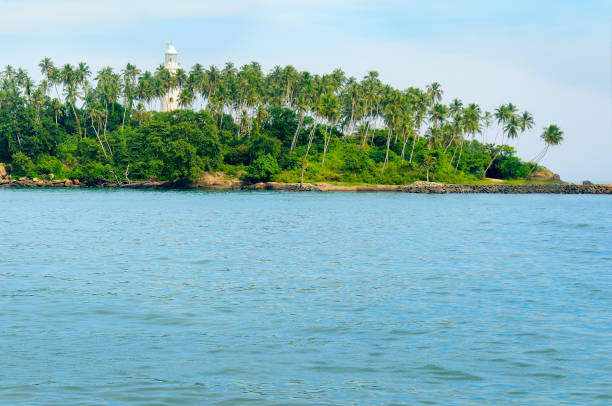 istock Lighthouse and turquoise ocean Sri Lanka . 1369610497