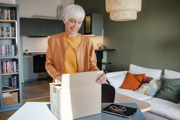 istock Online order and unpacking the box 1369610499