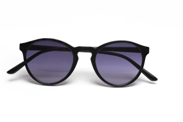 istock closeup sunglasses plastic dark lenses white background 1369611172