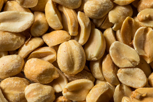 istock Healthy Roasted Salted Shelled Peanuts 1369611595