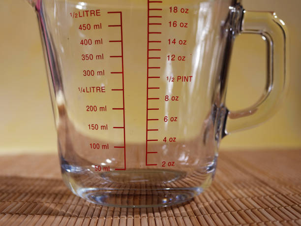 istock Empty measuring glass jug for liquid ingredients 1369611799