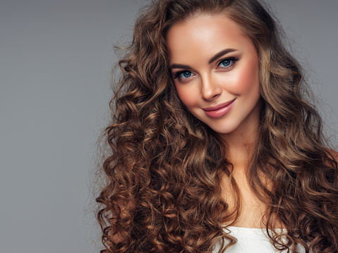 Young beautiful woman with perfect hair