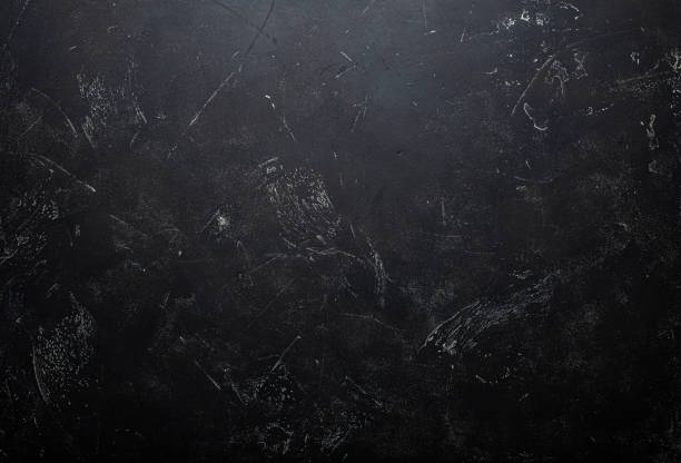 istock Black with white drops and strays abstract rustic concrete blank background copy space 1369614564