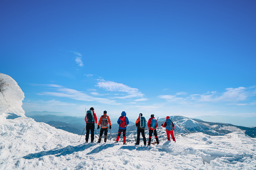 Climbers are enjoying the success of climbing the summit of the high altitude mountain  in winter time in Turkey ,recorded during a climbing expedition.