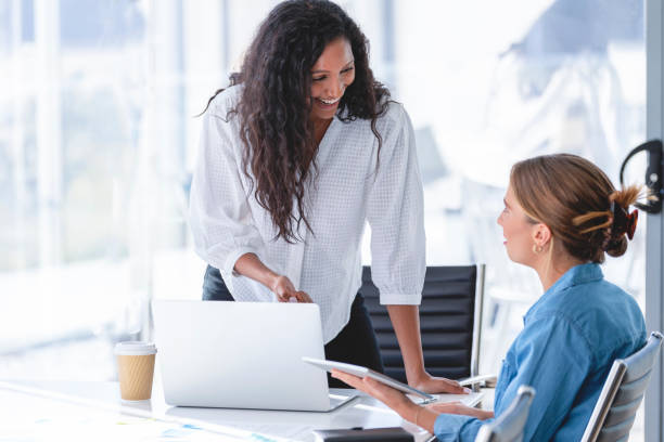istock Business colleagues having a conversation. 1369618057