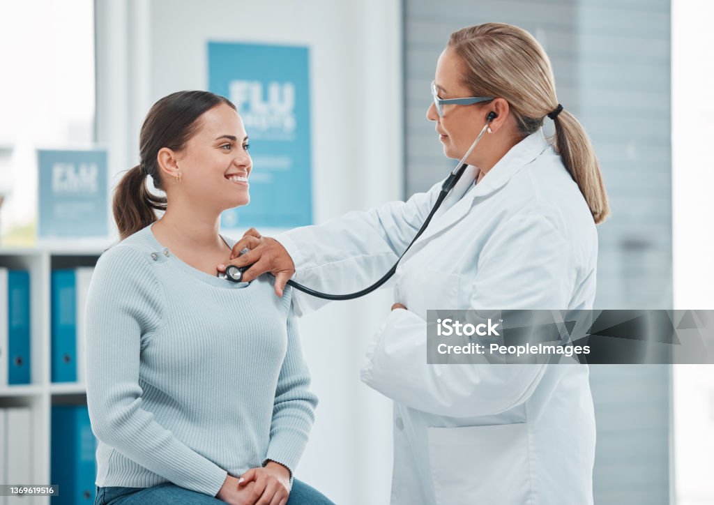 Shot of a doctor examining a patient with a stethoscope during a consultation in a clinic I've been taking better care of myself, doctor Doctor Stock Photo