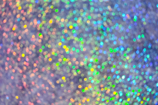 istock Saturated iridescent blurred background, rainbow neon, non-contrast texture background, shiny shimmery glamor, defocused 1369627020