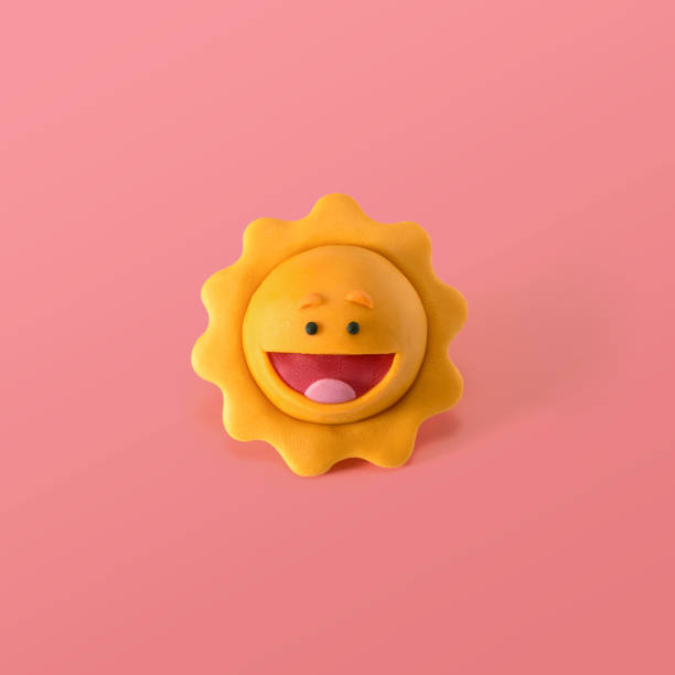 Three dimensional smiling sun figure made of plasticine
