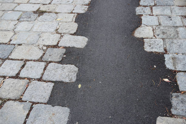 istock cobble stones and tarmac 1369627115