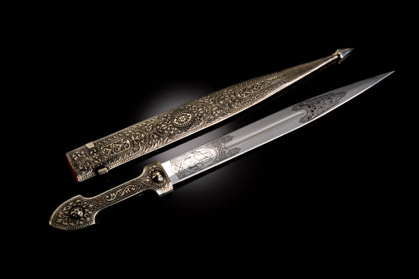 istock collectible silver dagger with scabbard on black 1369628434