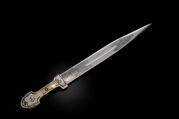 istock collectible silver dagger with scabbard on black 1369628454