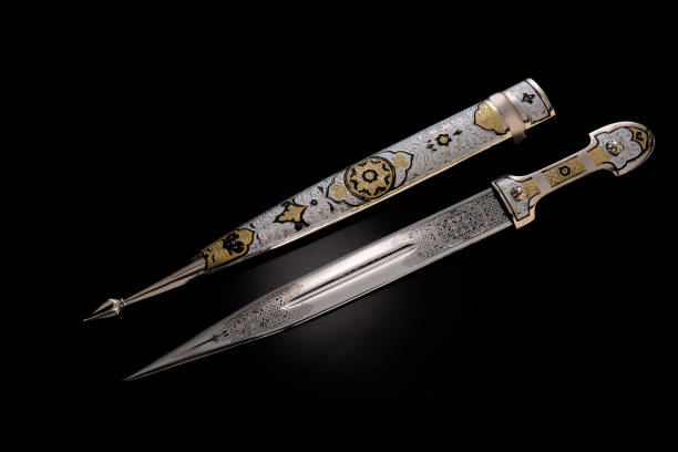 istock collectible silver dagger with scabbard on black 1369628460
