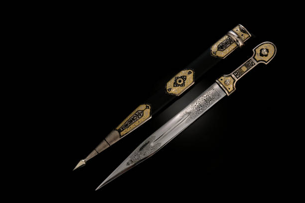 istock collectible silver dagger with scabbard on black 1369628481