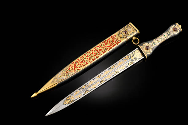 istock collectible silver dagger with scabbard on black 1369628487