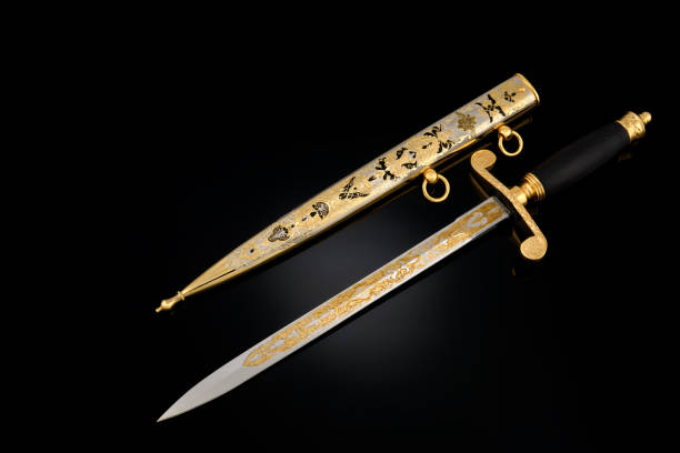 istock collectible silver dagger with scabbard on black 1369628516